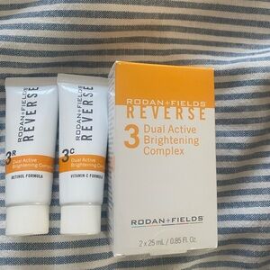 Rodan + Fields Reverse Brightening Complex - Orange and White